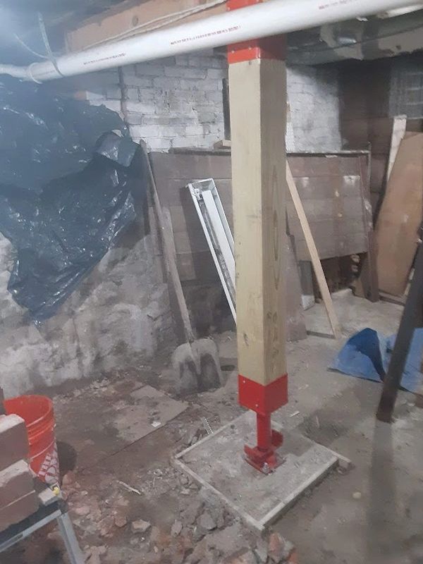 A Specially Designed Support Column to support a home's first floor, due to previous renovations.