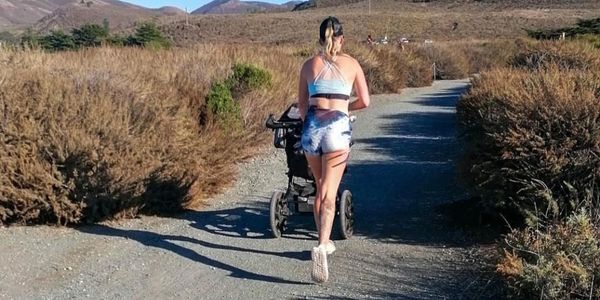 A mom running with a stroller