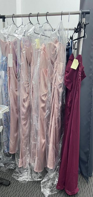 Beautiful bridesmaid dresses awaiting customer collection 