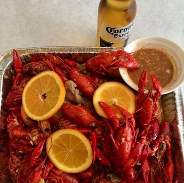 Crawfish tray with cajun seasoning mix and cajun garlic butter sauce.