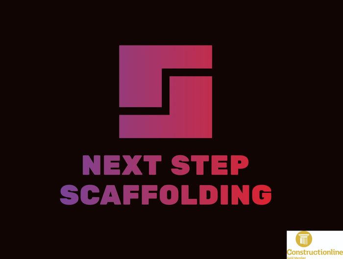 Stack of books next to pencils in a holder and a camera.