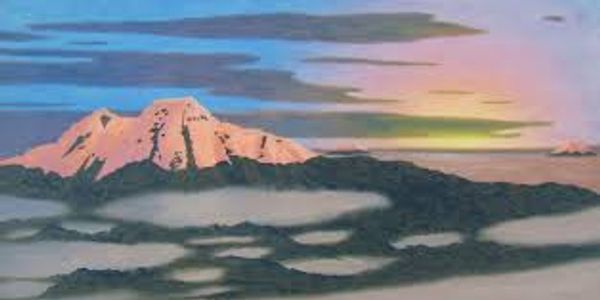 Sunset view of a snow-capped mountain with colorful sky.