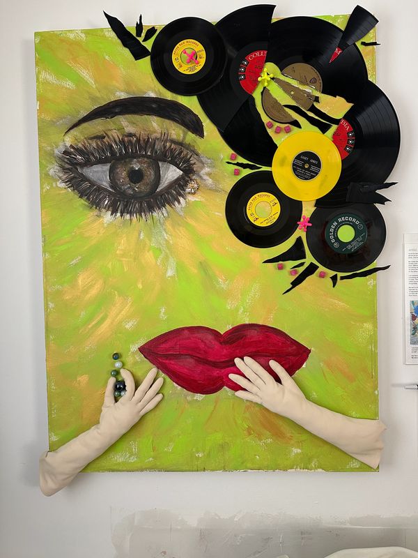 Mixed media portrait with vinyl records, gloves, and painted features on a green canvas.