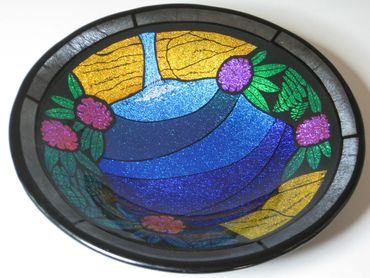 kiln formed glass bowl with dichroic glass