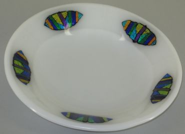 kiln-formed bowl with dichroic glass, eyelets