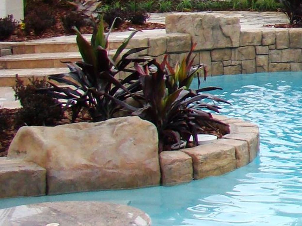 Accent boulders and coping.