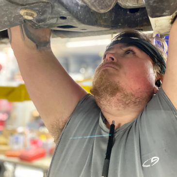 Scott working on a 2010 Jeep 4WD Cable