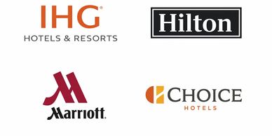 Logos of four major hotel chains: IHG, Hilton, Marriott, and Choice Hotels.
