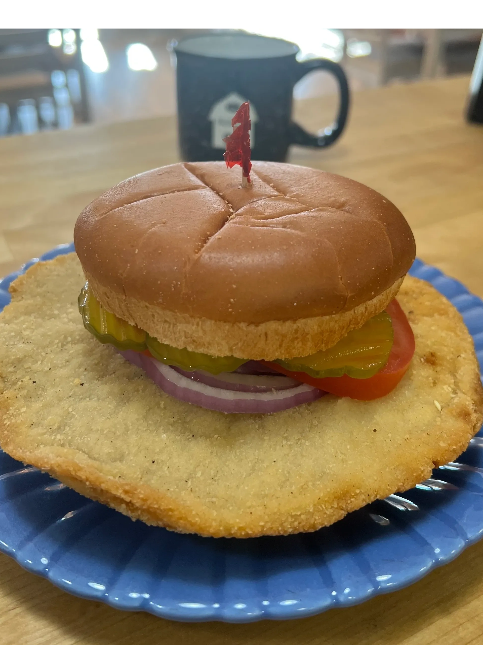 Jumbo Pork Tenderloin, breaded and deep fried to a golden crisp.  Served on a Brioche Bun with Dijon