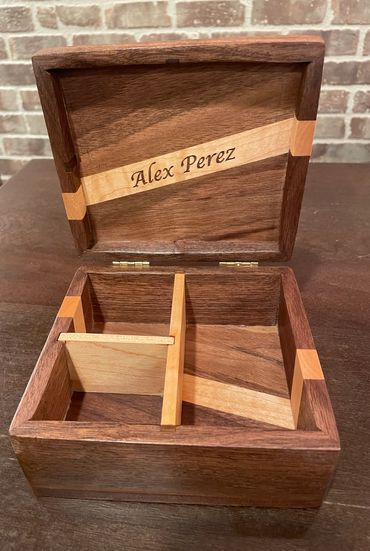 Custom jewelry box in Walnut with Maple ribbon running through it