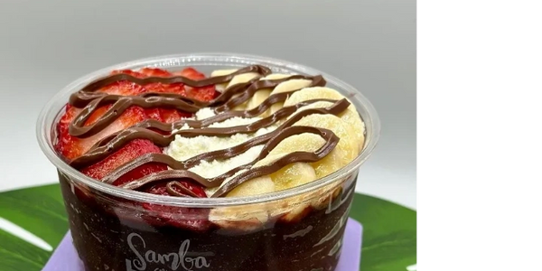 Acai bowl with strawberries, nido, banana and nutella