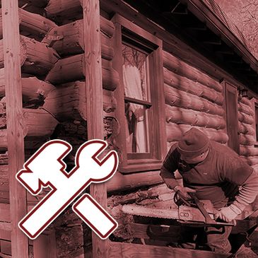 Worker using chainsaw on a log cabin exterior.