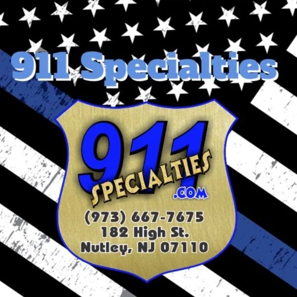 Logo for 911 Specialties with contact info and a blue line flag background.