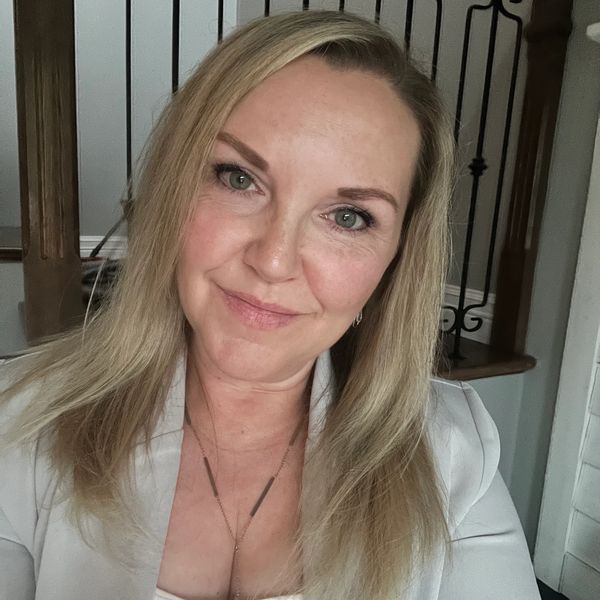 Charlene co-founder of Ninja Scoopz Airdrie's best poop scoop company!