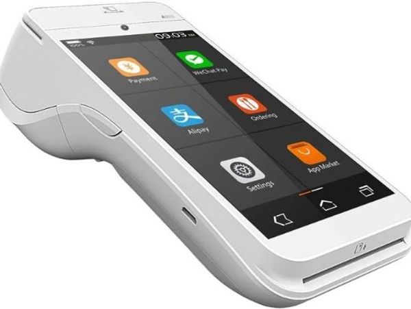 Modern white handheld payment terminal with touchscreen interface.