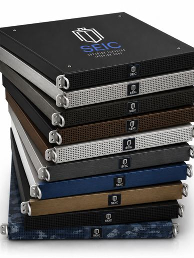 Stack of SEIC protective cases in various colors and designs.
