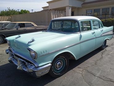 Note the wheels. We went back to the original wheels and wheel covers. Amazingly, they were in the t