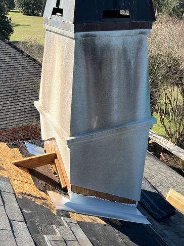 Chimney pan replacement and stucco repair