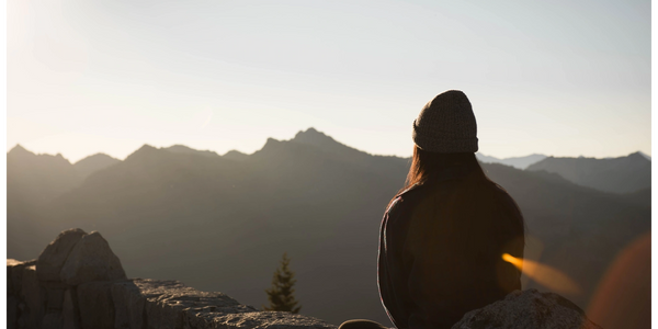 Person is using both mindset and breathwork techniques to focus the mind and harness positive energy 