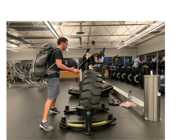 Client Training for Mountain Climbing in an indoor gym.