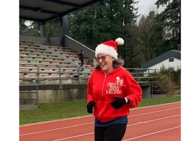 Client Running on track at Mahon Park, North Vancouver