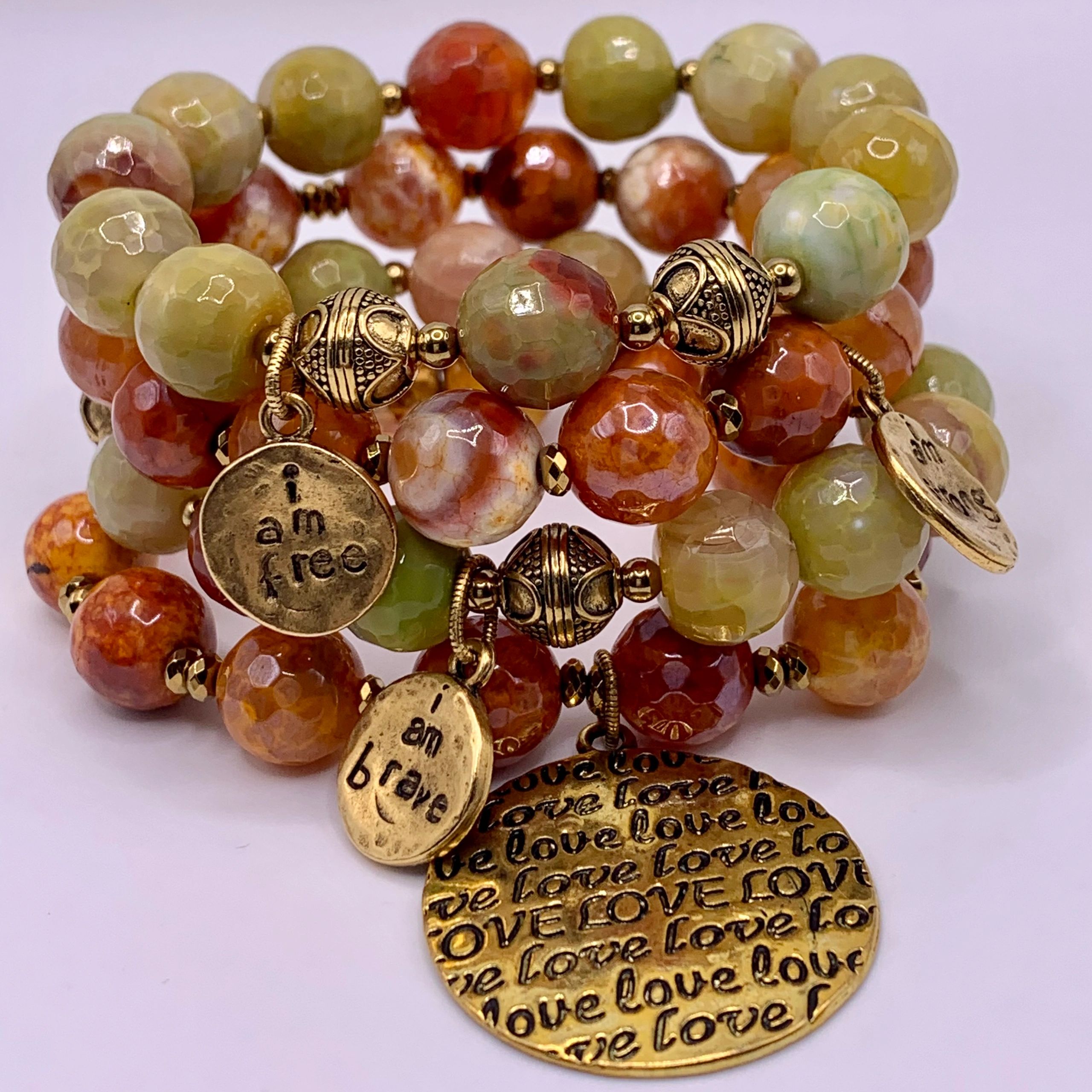 Four stack beaded bracelet with charms