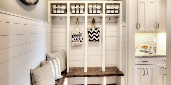 mudroom custom bench organization hooks cubbyholes entryway organization shiplap white  