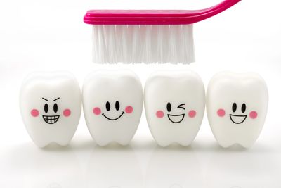 Cute teeth getting brushed with a toothbrush