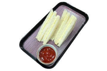 Plate of butter sandwiches with a side of ketchup.