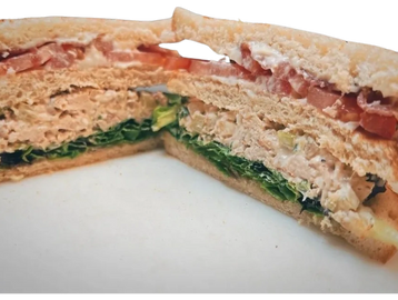 woolworth club sandwich with chicken salad, lettuce, tomato, mayo and bacon