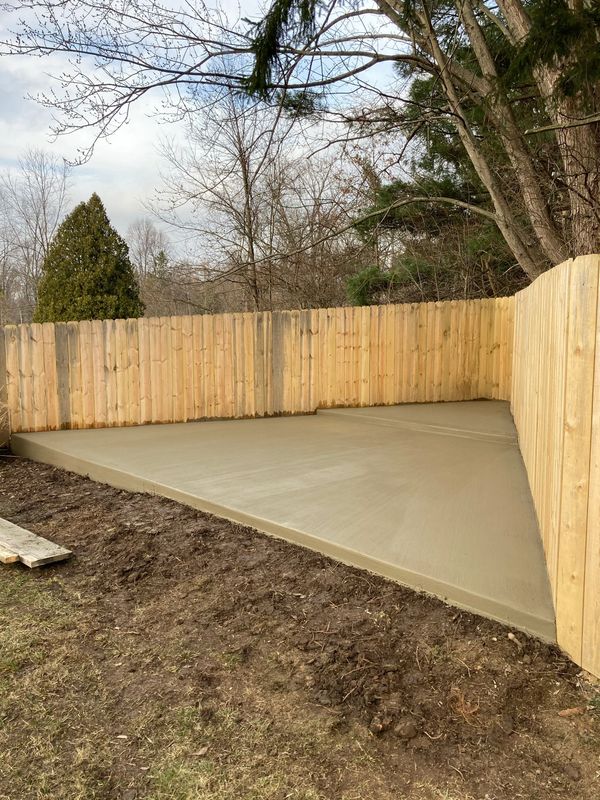 yard corner concrete patio