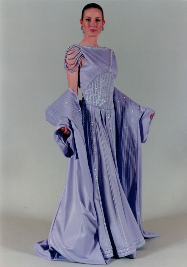 Neza Zivkovic wearing Andromeda, lavender coloured dress in a leather look fabric, entry 113. 