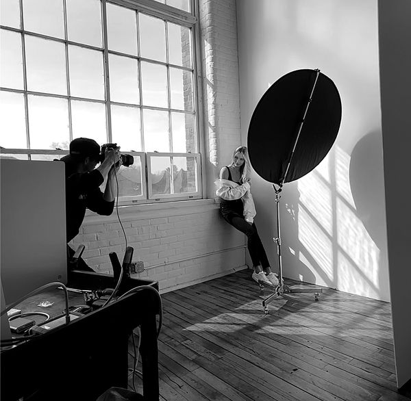 photographer working with model studio lighting easthampton ma portrait shoot