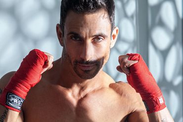 Boxer with red gloves ready to fight