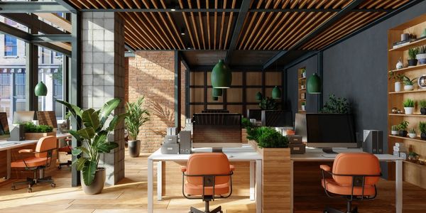 A soothing and modern workspace with plants, natural textures, and lots of light.