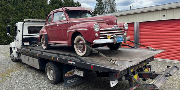 Pulled customers car out of storage and moved into the garage at his home