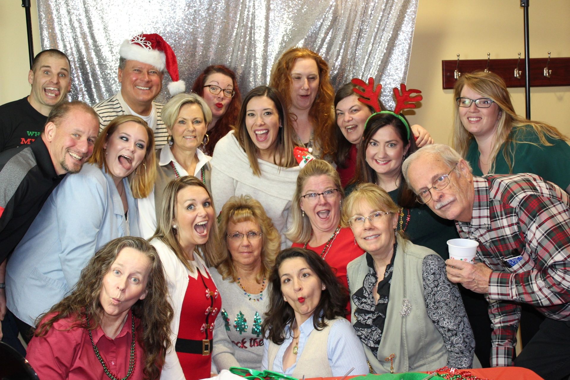 Crabtree Chiropractic team smiling at Christmas party