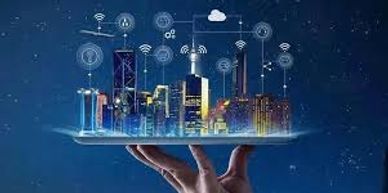 Hand holding a digital city model with connected smart technology icons.