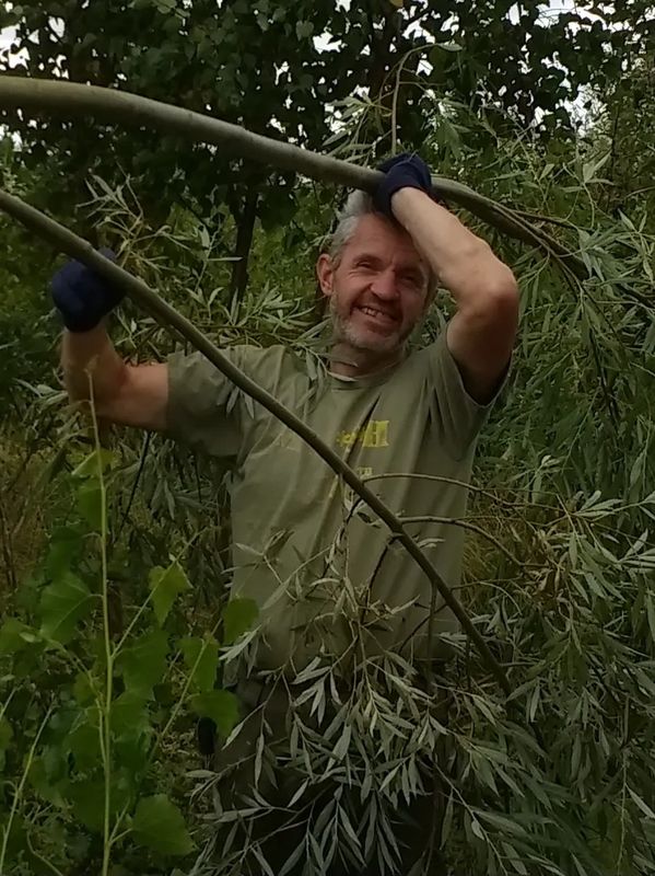 "This is where it all begins. My husband in our Lincolnshire woodland — and yes, he really does smil