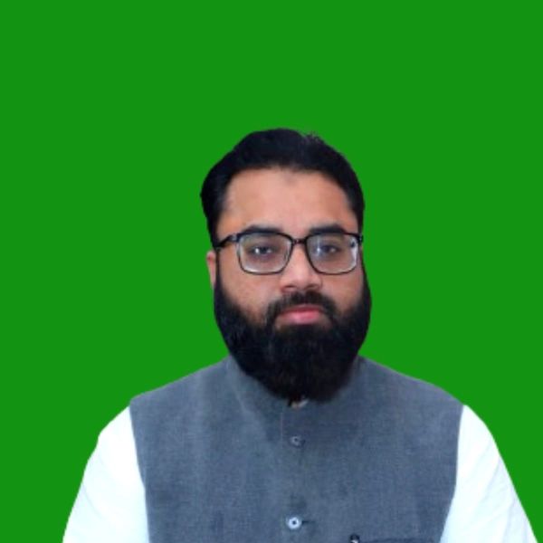 Portrait of a bearded man wearing glasses and a grey vest against a green background.