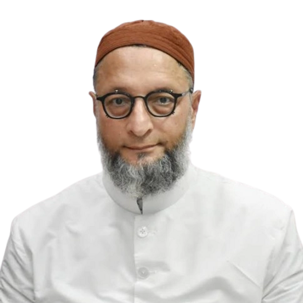 Man with glasses, beard, and brown cap wearing a white traditional outfit.