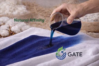 Pouring dye over fabric