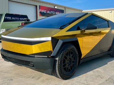 2024 Cybertruck Foundation wrapped in gold chrome and satin black!