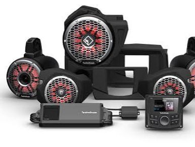 Marine audio system with multiple speakers and control units.