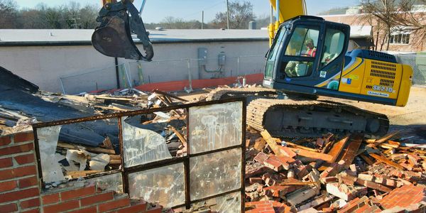 Excavator demolition services