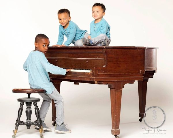 Fine Art Children's Portrait editorial vibe Charleston SC 3 boys grand piano white backdrop