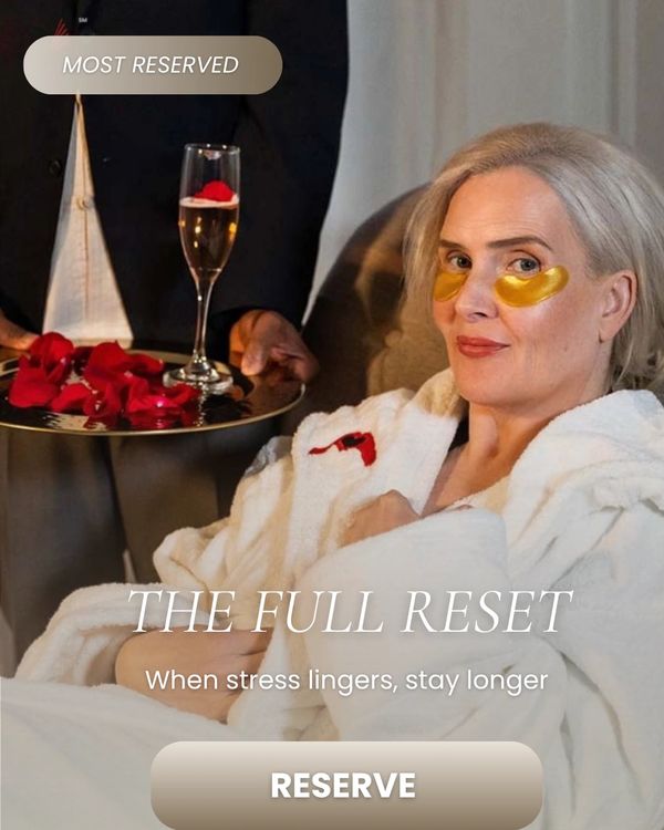 Woman enjoying collagen eye masks and champagne during a private mobile spa experience in Los Angele