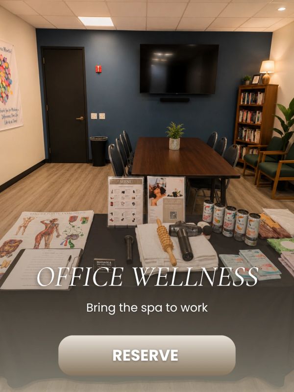 Office wellness spa setup with massage tools and refreshments.