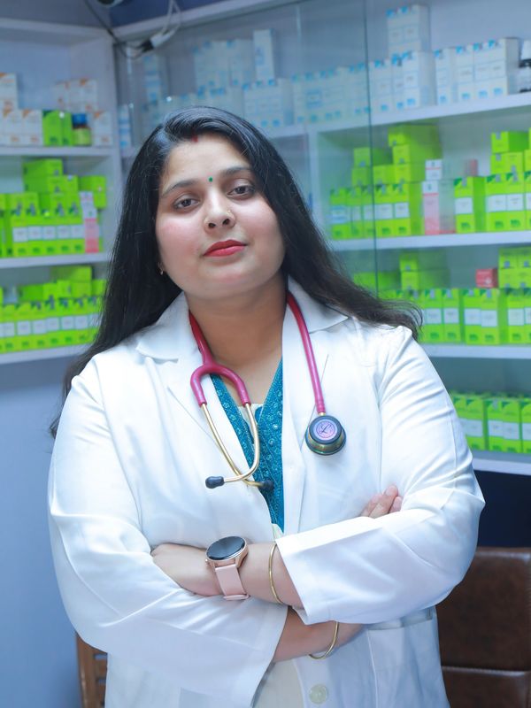 Confident female doctor with stethoscope in a pharmacy setting.