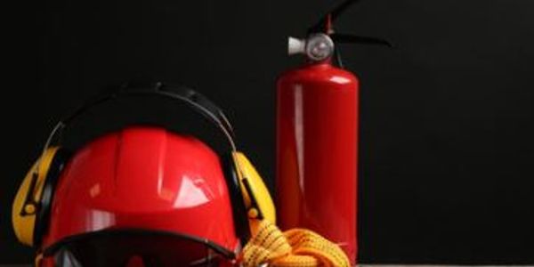 Fire safety gear including helmet, headphones, rope, and extinguisher.